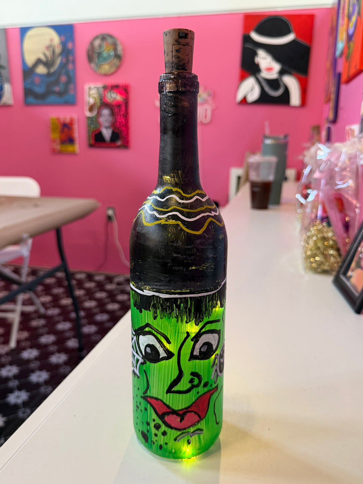 Paint a Spooky Halloween Wine Bottle with twinkle lights