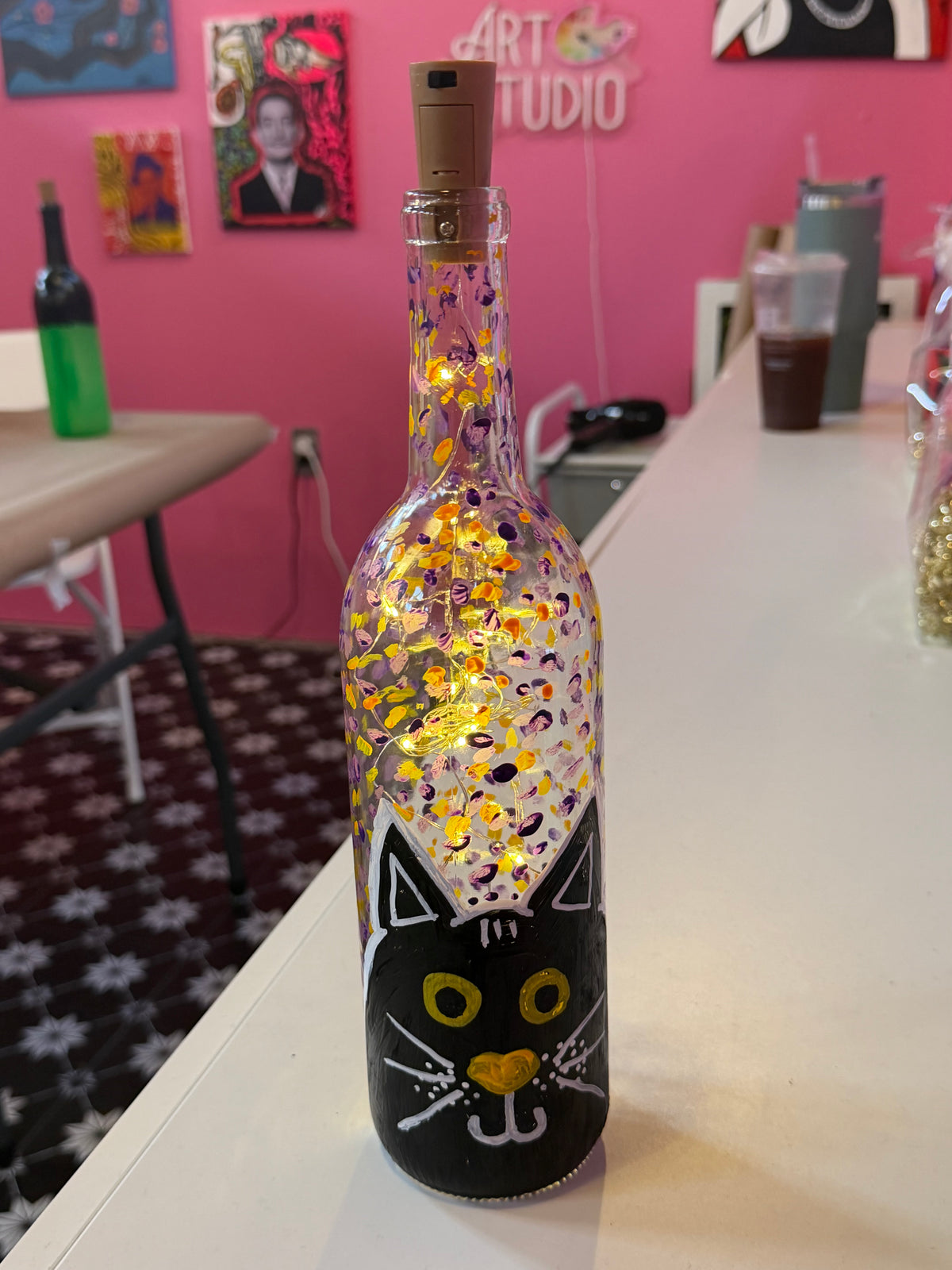 Paint a Spooky Halloween Wine Bottle with twinkle lights