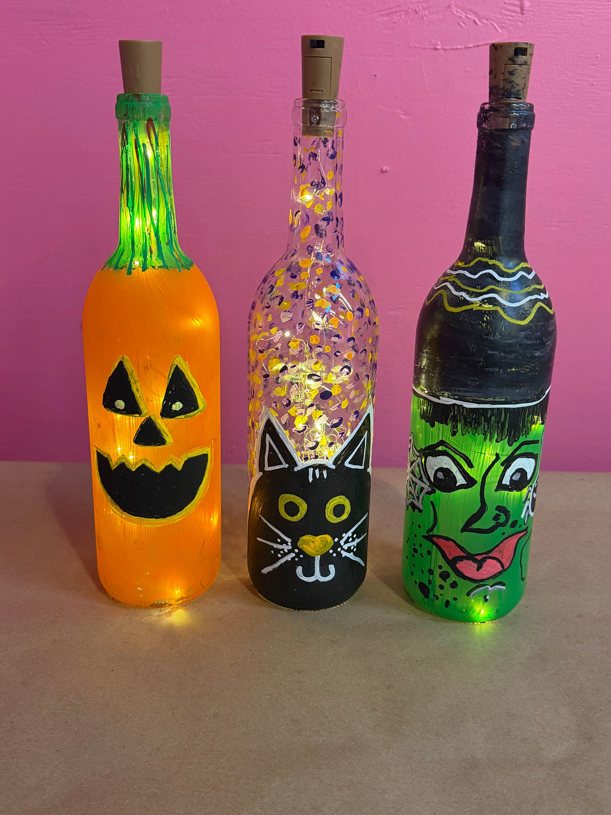 Paint a Spooky Halloween Wine Bottle with twinkle lights